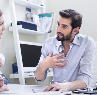 Doctor consulting with patient